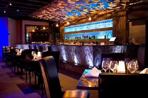 Dining area and bar at Taboo Lounge